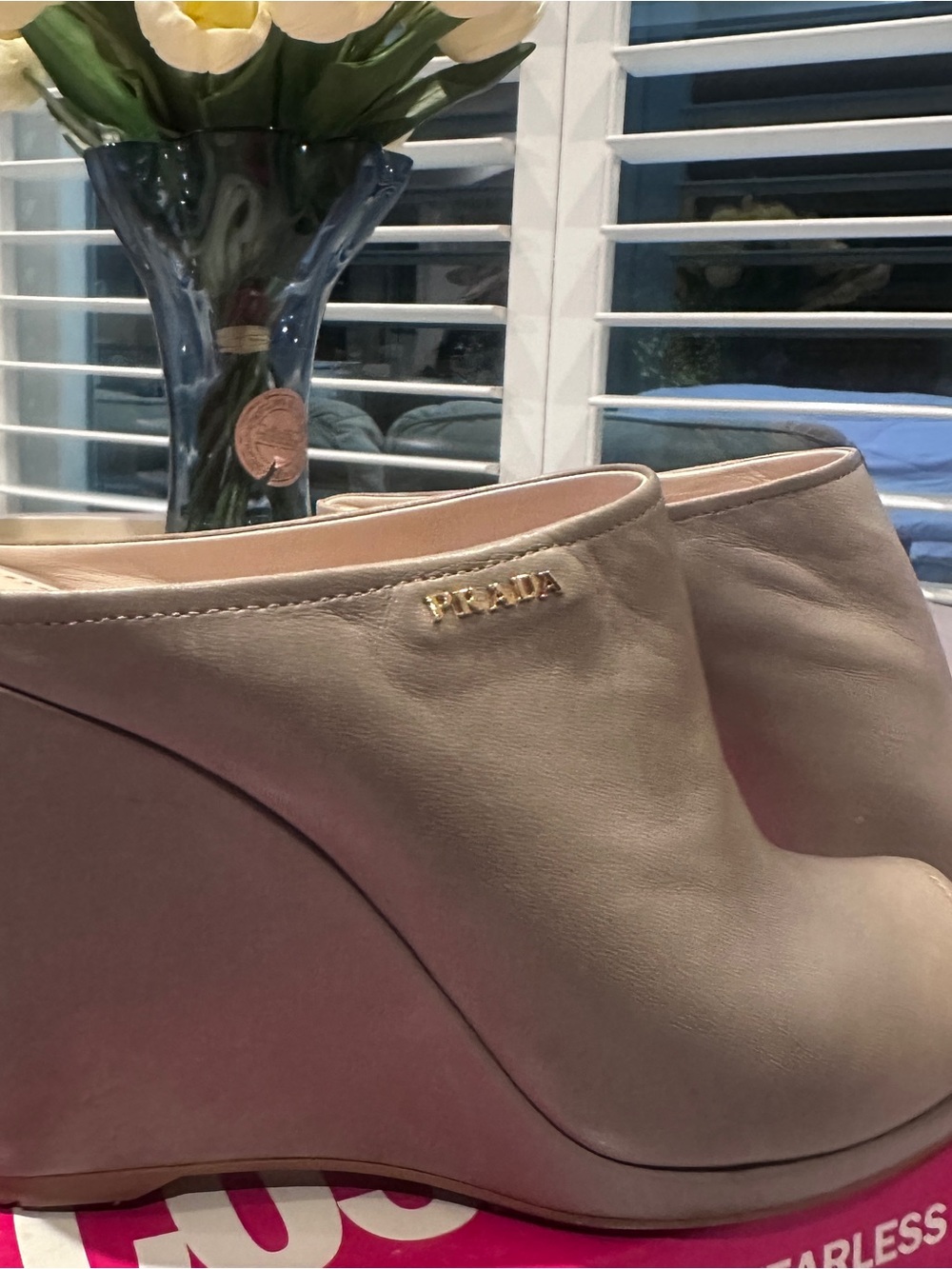 Prada Taupe Leather Wedge Mules with Gold Logo